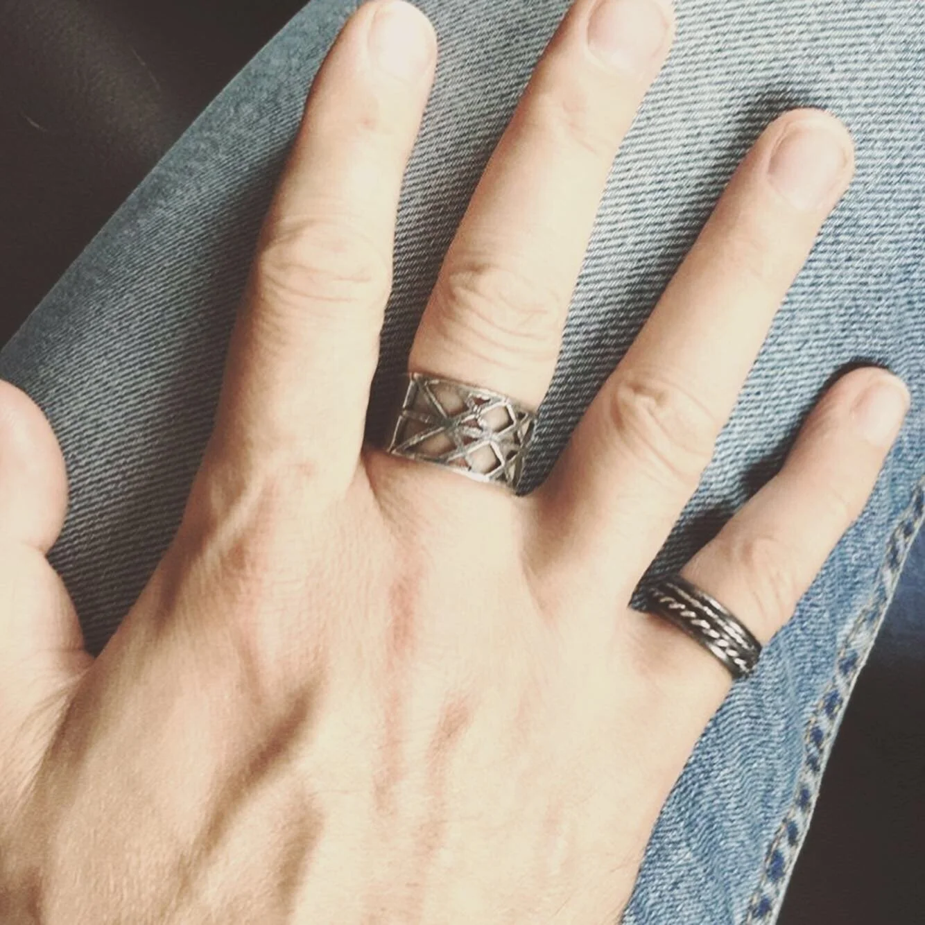 Andrea Van Cleef's silver runic rings