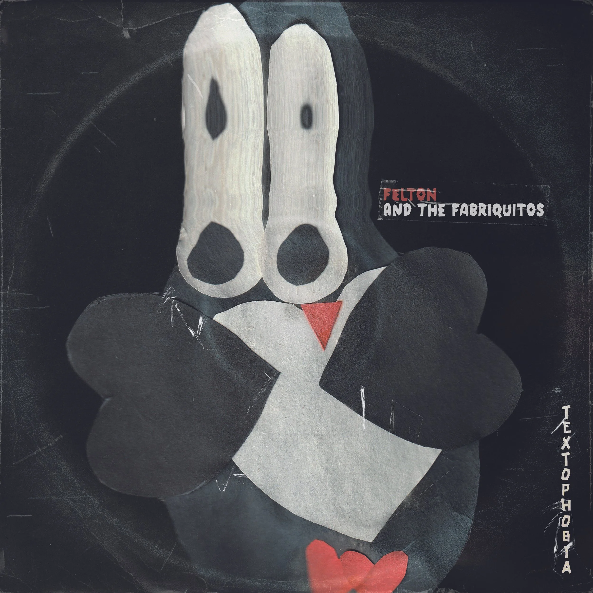 Illustration of a rabbit with its paws up, featuring large white ears with black and white eyes, a small red triangle nose, and a red heart at the bottom. Text reads "Felton and the Fabriquitos" and the word "Textophobia" runs vertically on the right side.
