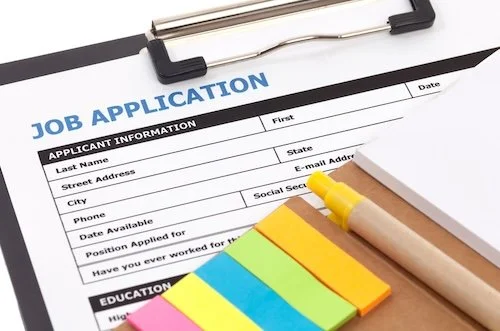 Job application with sticky notes