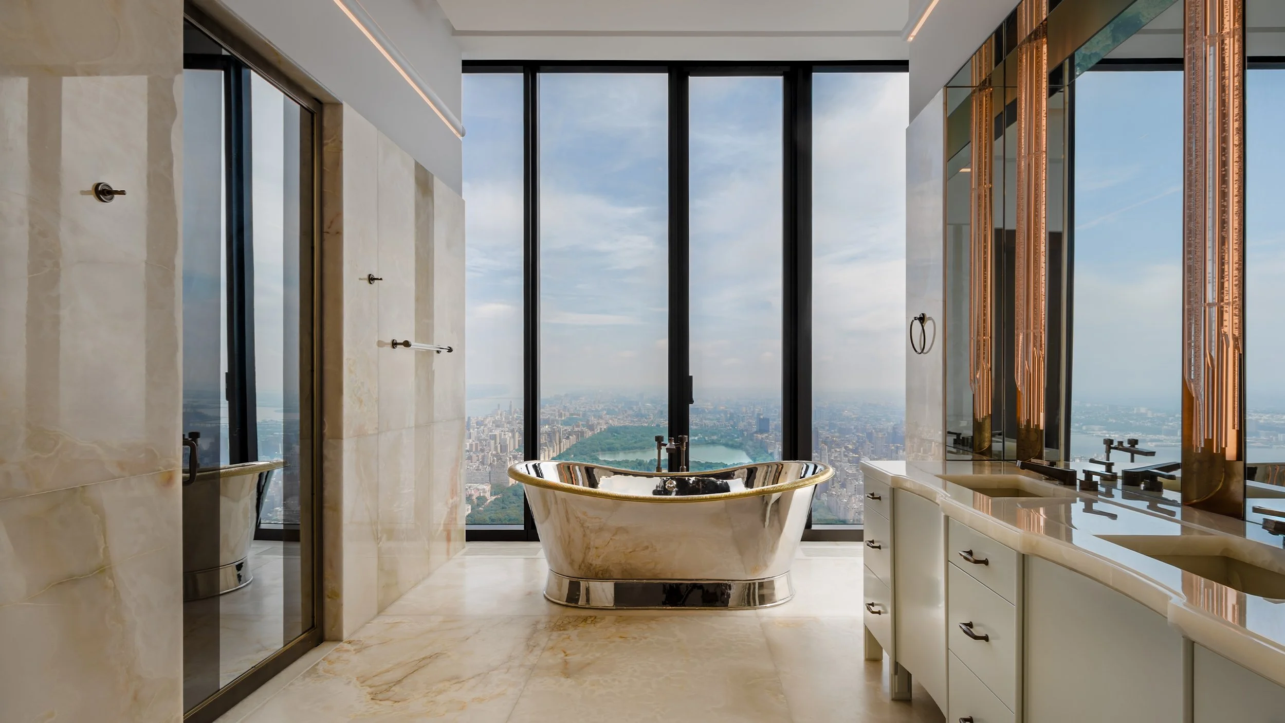 Luxurious bathroom with a freestanding bathtub, large floor-to-ceiling windows with city views, marble floors and walls, and modern fixtures.