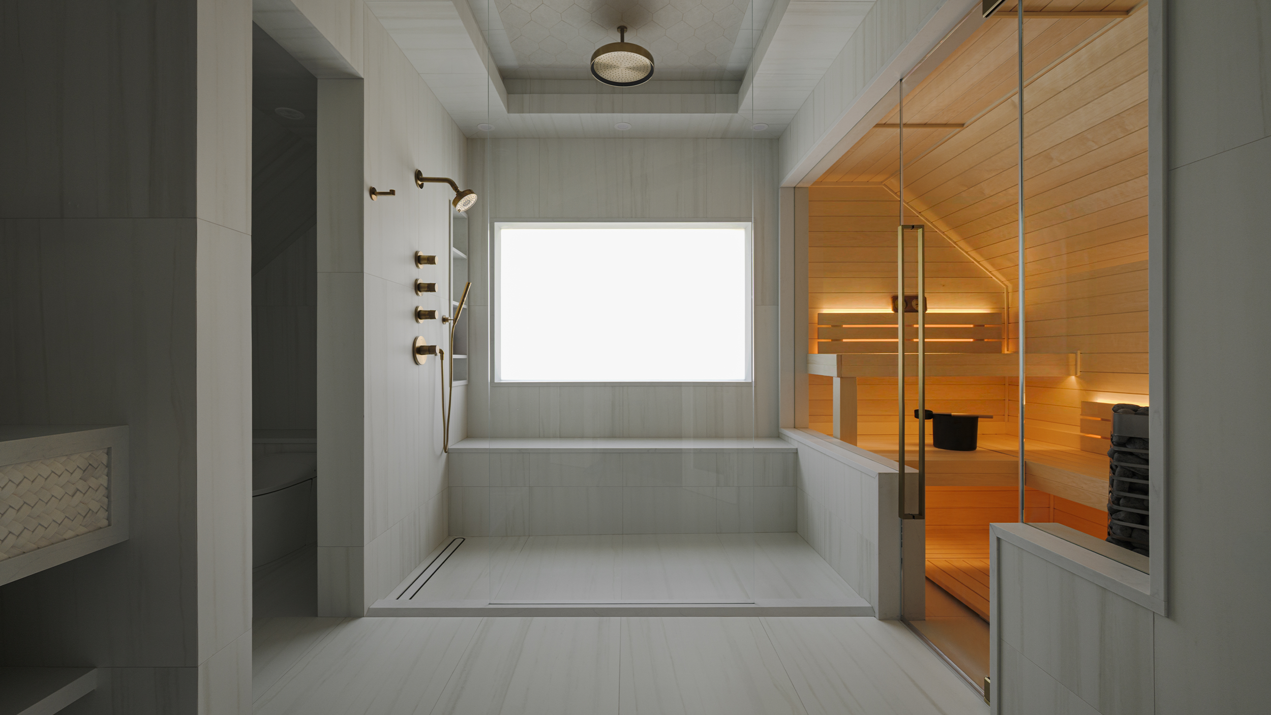 A Spa-Like Primary Bath Defined by Glass and Light