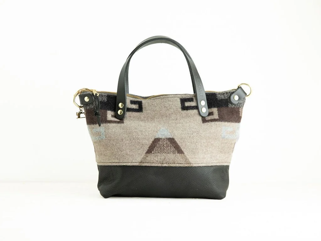 Handmade Tan Triangle wool Bitsy crossbody purse with black leather bottom and handles, crafted in Portland