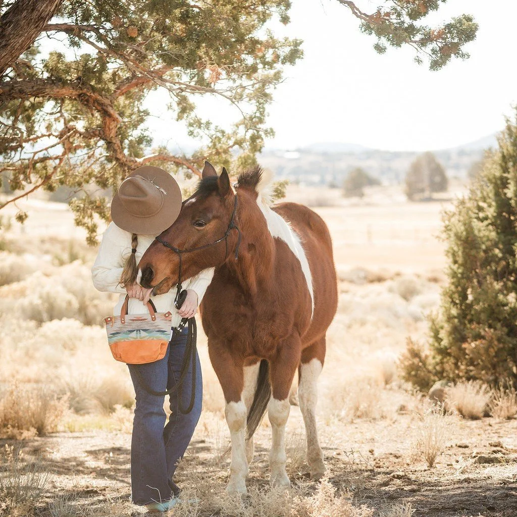 This indigo and cream beauty is finally off the bench and ready for a walk. I spend a lot of time laying patterns on the leathers at the farm imaging what the entire outfit would look like.  I was imagining this one specifically for those "in-be