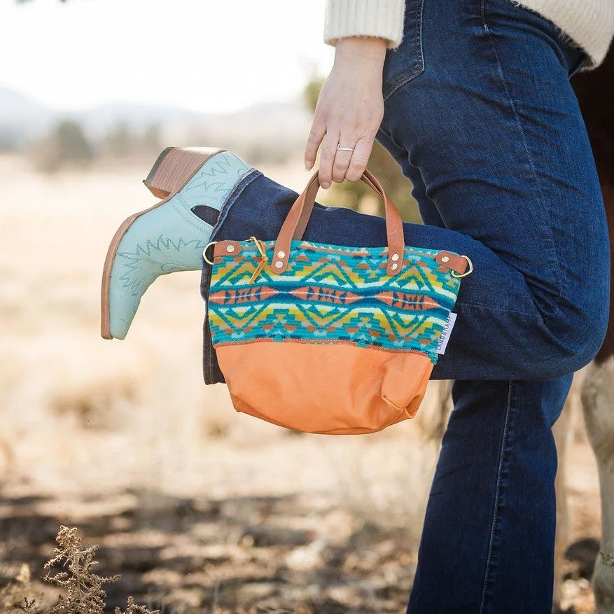 Last year Kate and I got matching cowgirl boots in pink and teal.  I love pretty and delicate things but they can't be too precious that they can't be worn outside. 

That&rsquo;s why I&rsquo;m pretty picky about the leather I use on these bag bottom
