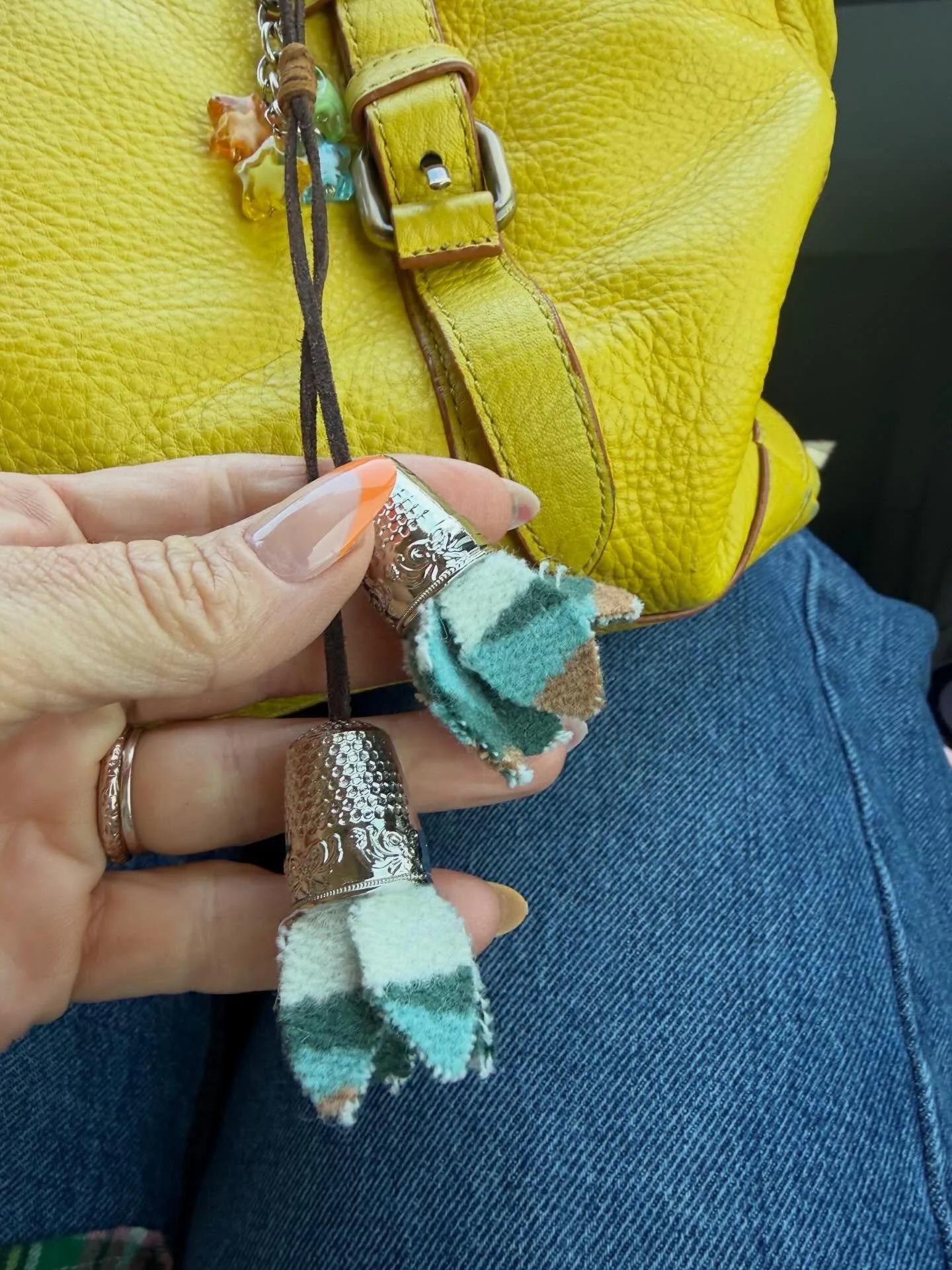 Mae by @maebydesign_studio made this adorable purse charm from wool scrap and thimbles. I love it so much I switch it to my purse of the day every time. I think they&rsquo;d also look cute as earrings or a short bolo style necklace. We&rsquo;ve chatt