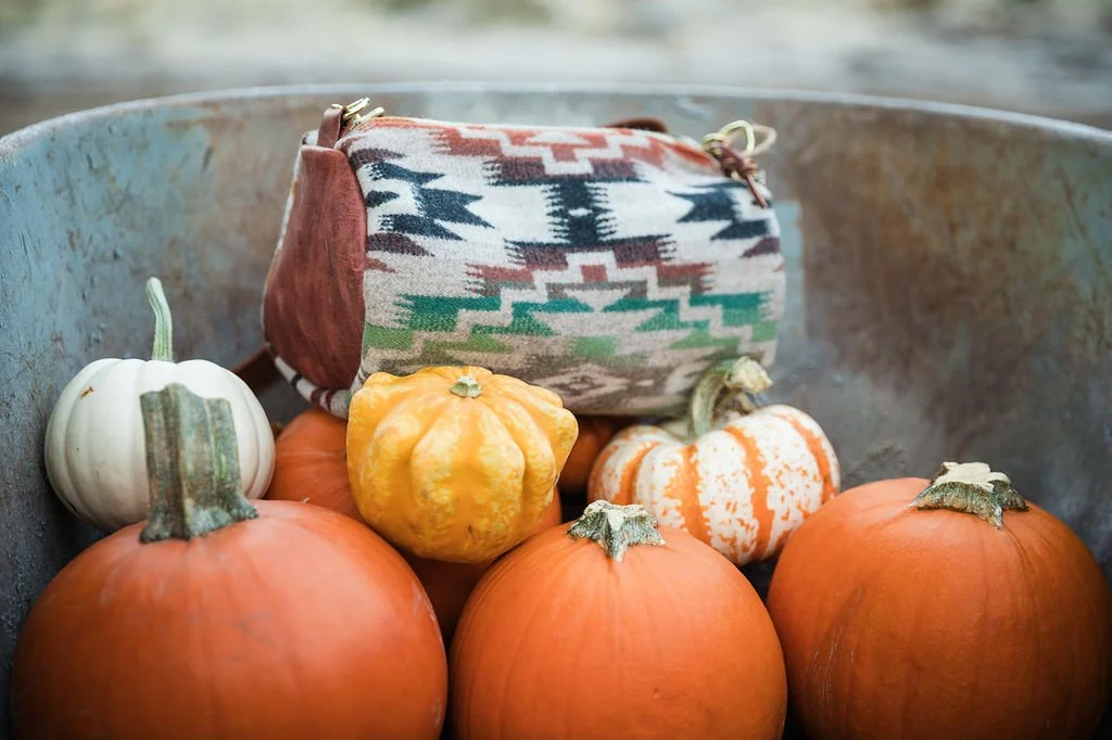Detail view of the Wool Barrel Crossbody Bag in Mesilla featuring YKK zipper, leather pull, and premium hardware by Land & Kamp