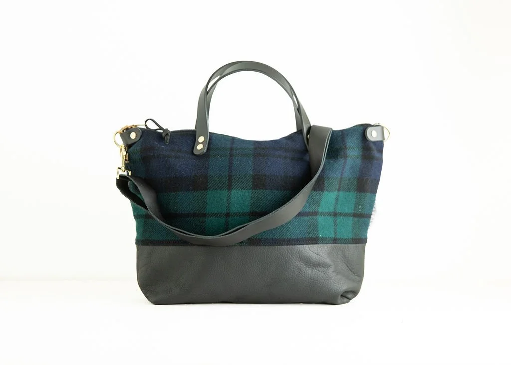 Black Watch Tartan wool crossbody purse shown with detailed angles and top-grain leather handles
