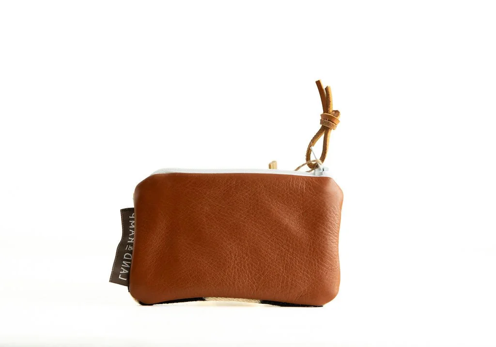 Backside of Rancho Arroyo Black card pouch styled with keys and credit cards as a minimalist grab-and-go accessory by Land & Kamp