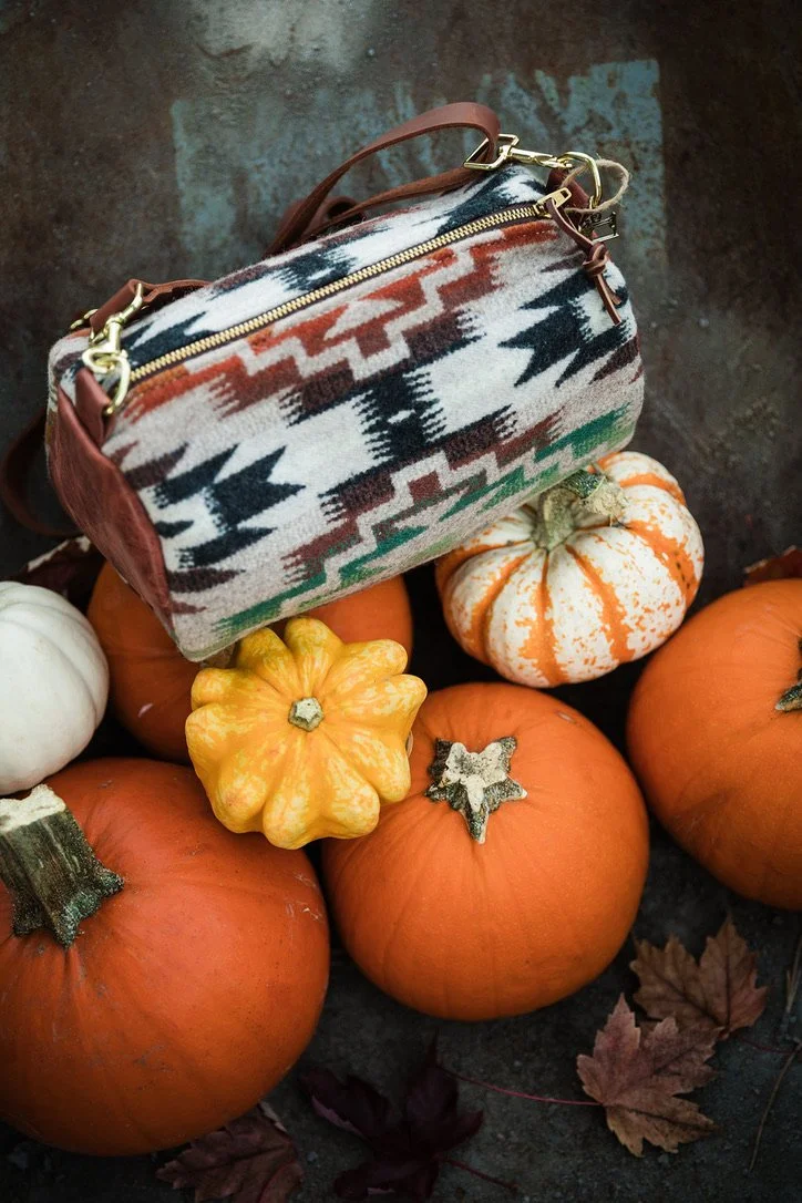 Handmade Pendleton Mesilla wool barrel crossbody bag with leather strap and trim, crafted in Portland