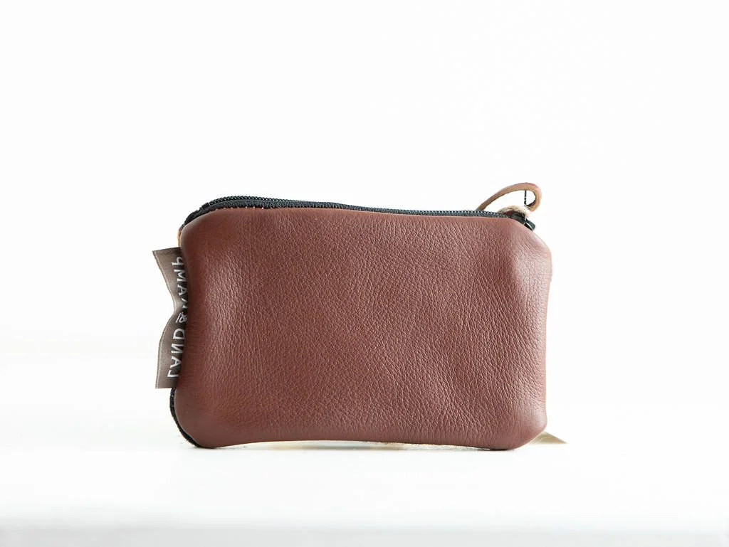 Backside of Rancho Arroyo Black card pouch styled with keys and credit cards as a minimalist grab-and-go accessory by Land & Kamp