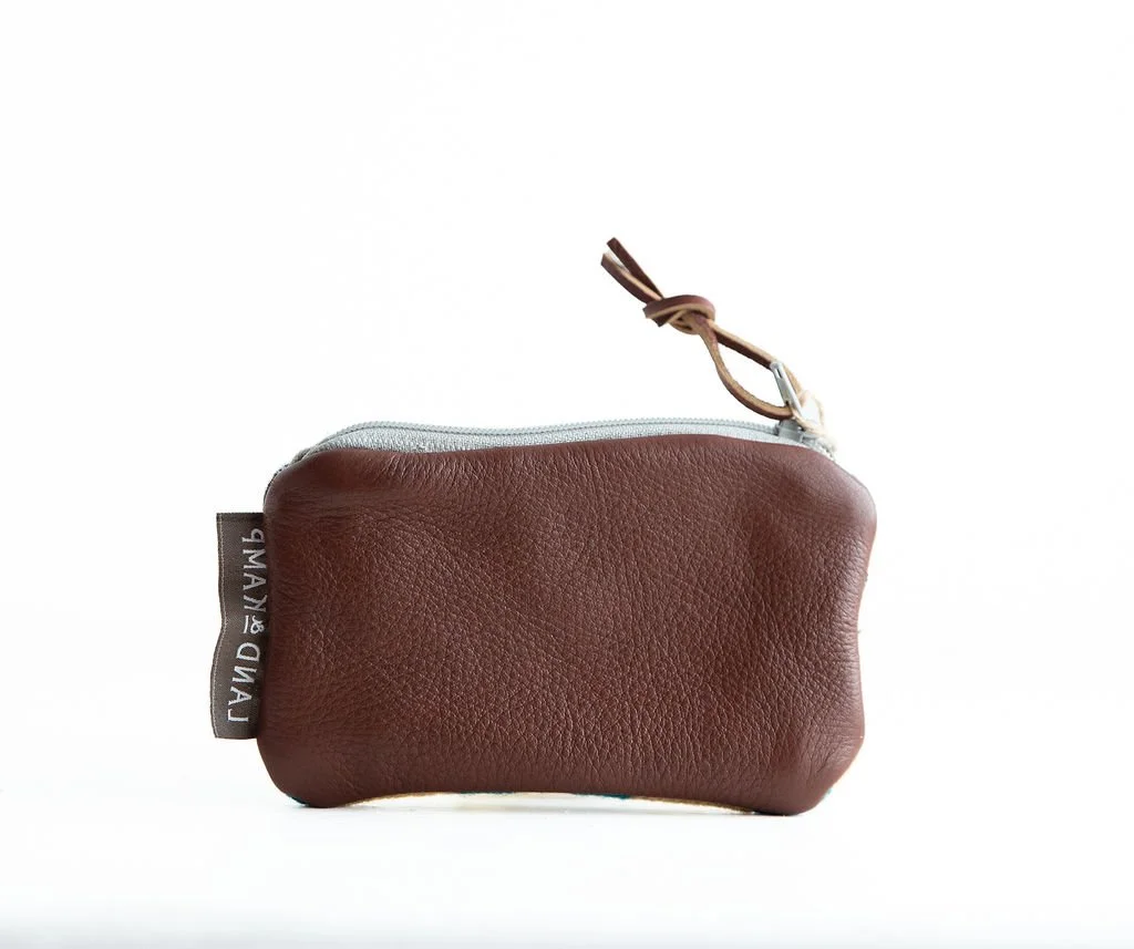 Backside of Rancho Arroyo Black card pouch styled with keys and credit cards as a minimalist grab-and-go accessory by Land & Kamp