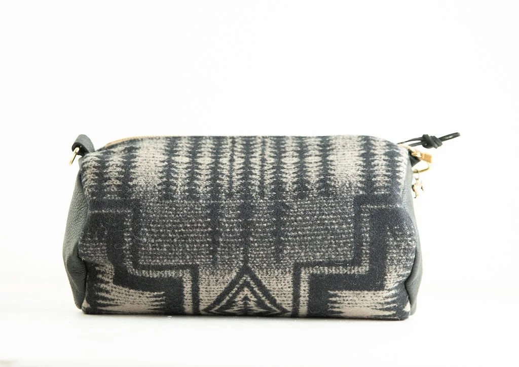 Handmade Pendleton wool barrel crossbody bag with leather strap and trim, crafted in Portland