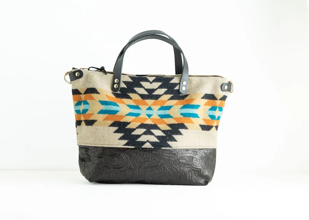 Handmade Arroyo Rancho Black wool crossbody purse with premium stamped leather bottom and handles, crafted in Portland