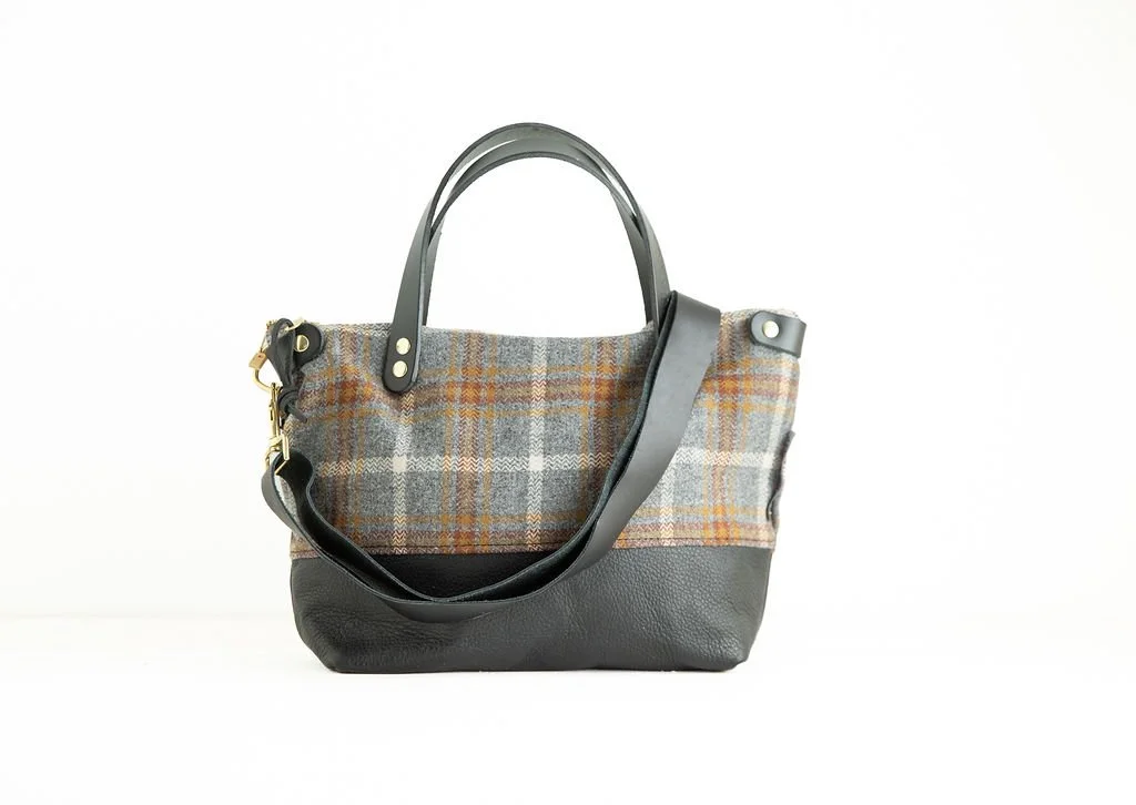 Detachable strap Detail view of the Wool Bitsy Crossbody Purse | Grey and Gold Plaid featuring YKK zipper and leather trim by Land & Kamp