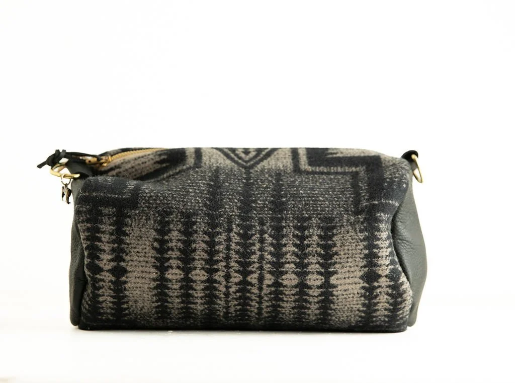 Handmade Pendleton wool barrel crossbody bag with leather strap and trim, crafted in Portland