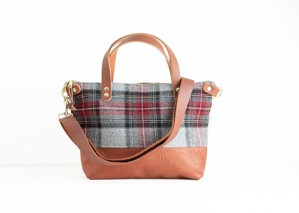 Detachable strap Detail view of the Wool Bitsy Crossbody Purse | Grey Stewart Tartan featuring YKK zipper and leather trim by Land & Kamp