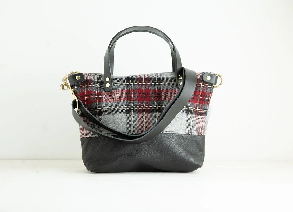 Detachable strap Detail view of the Wool Bitsy Crossbody Purse | Grey Stewart Tartan featuring YKK zipper and leather trim by Land & Kamp