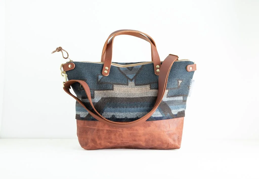 Blue Shale wool crossbody purse shown with detailed angles and top-grain leather handles