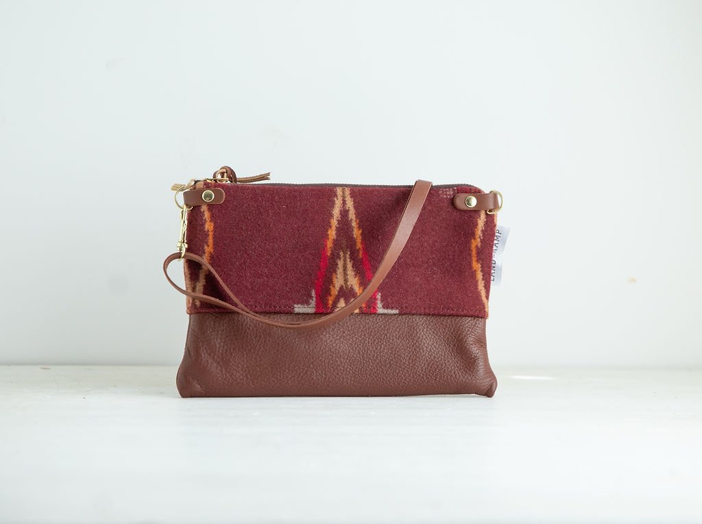 Detail view of the Sagebrush wool 3-in-1 wristlet bag featuring YKK zipper and leather trim by Land & Kamp