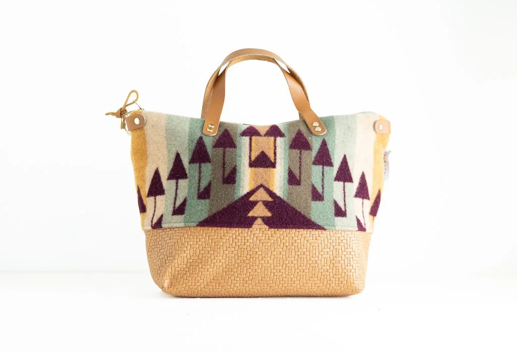 Handmade Short Arrow wool crossbody purse with basketweave stamped leather details, crafted in Portland
