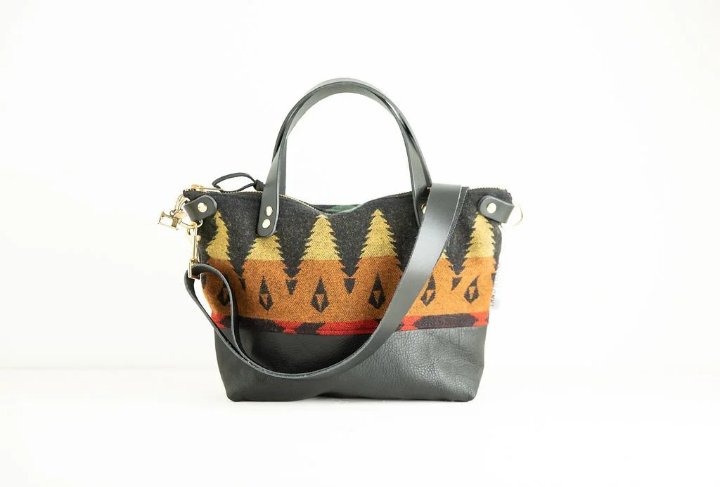 Detachable Strap Detail view of the Wool Bitsy Crossbody Purse | Tree Line featuring YKK zipper and leather trim by Land & Kamp
