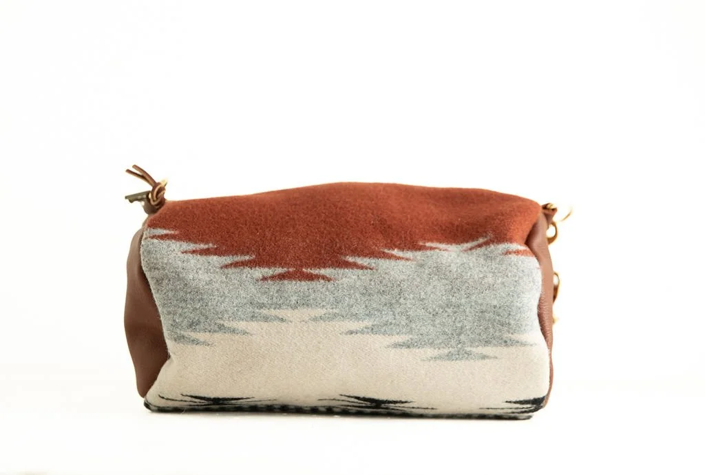 Handmade by Land and Kamp Anvil Cream pattern wool barrel crossbody bag with leather strap and trim, crafted in Portland