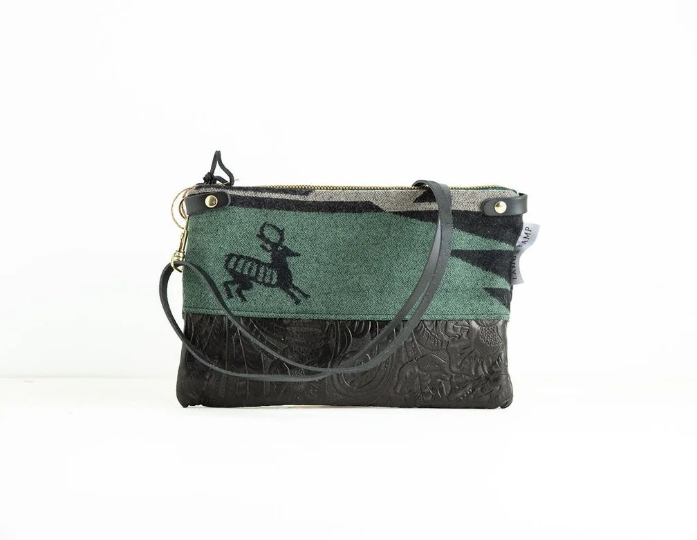 Stamped leather Detail view of the Forest Stag wool 3-in-1 wristlet bag featuring YKK zipper and leather trim by Land & Kamp