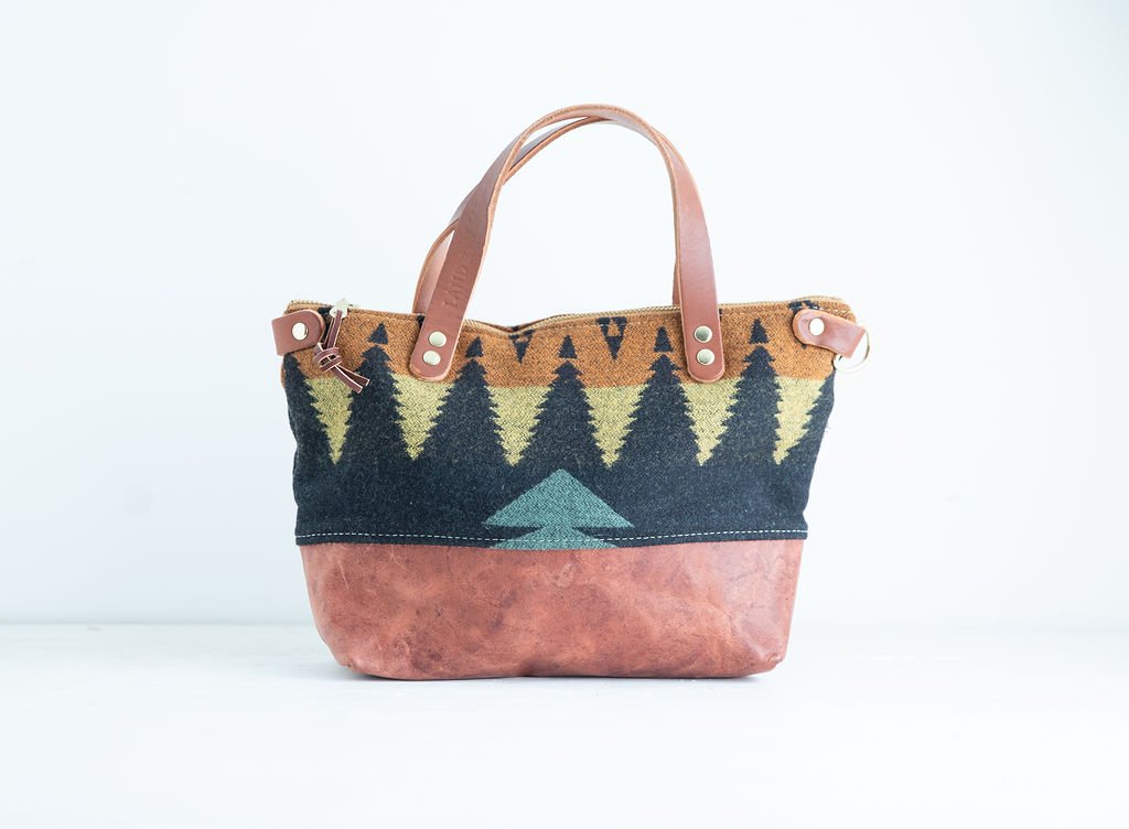 Handmade Tree Line wool Bitsy crossbody purse with brown leather bottom and handles, crafted in Portland
