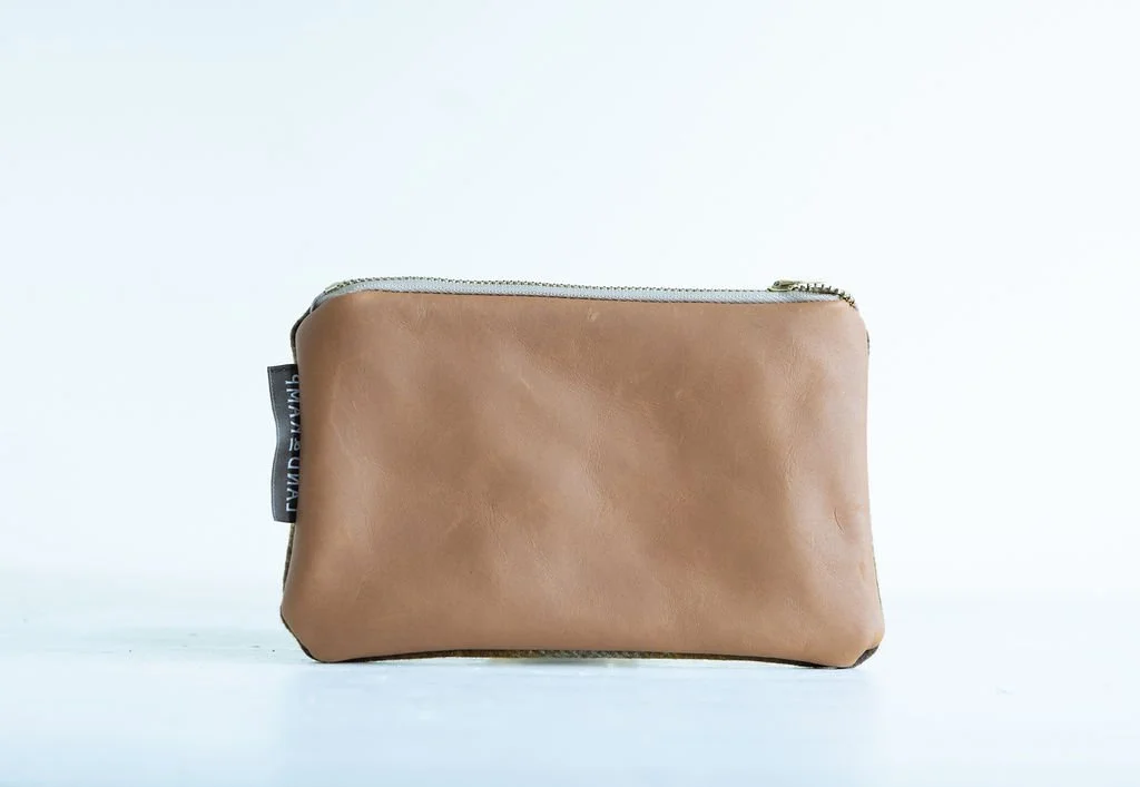 Backside in brown leather Detail view of the Brown and Gold Ombre wool pouch featuring YKK zipper and leather pull tag by Land & Kamp