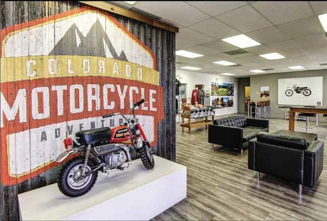 Painted the logo on this rustic wall for Colorado Motorcycle Adventures