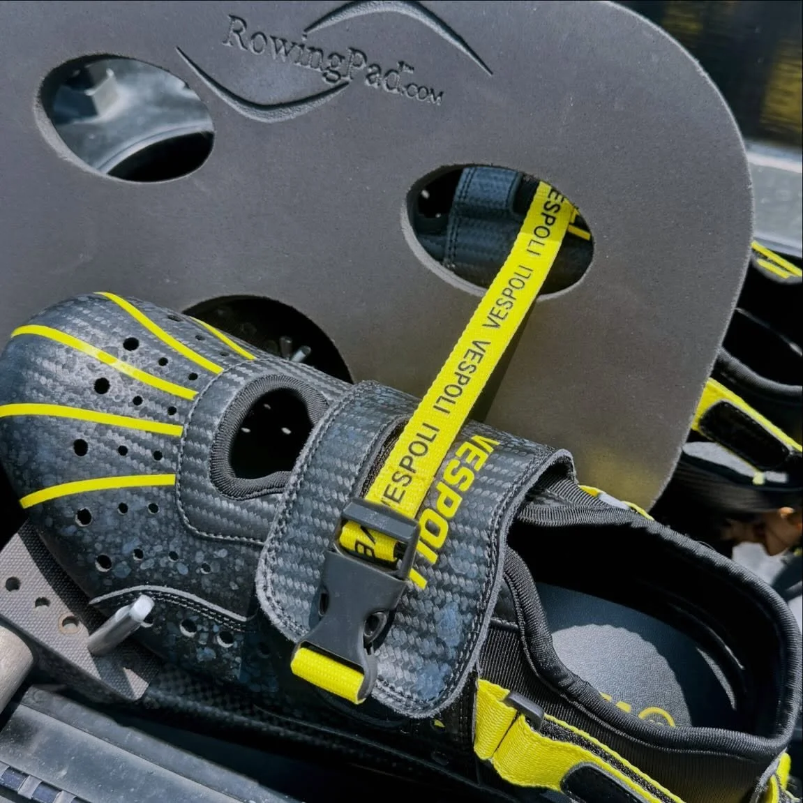 A lot of exciting things happened at USRowing RowFest, including this amazing discovery: never know what to do with your @rowingpad when carrying a boat while wearing a uni? Thread your @vespoliusa shoe strap through a hole in the pad! Seriously, how