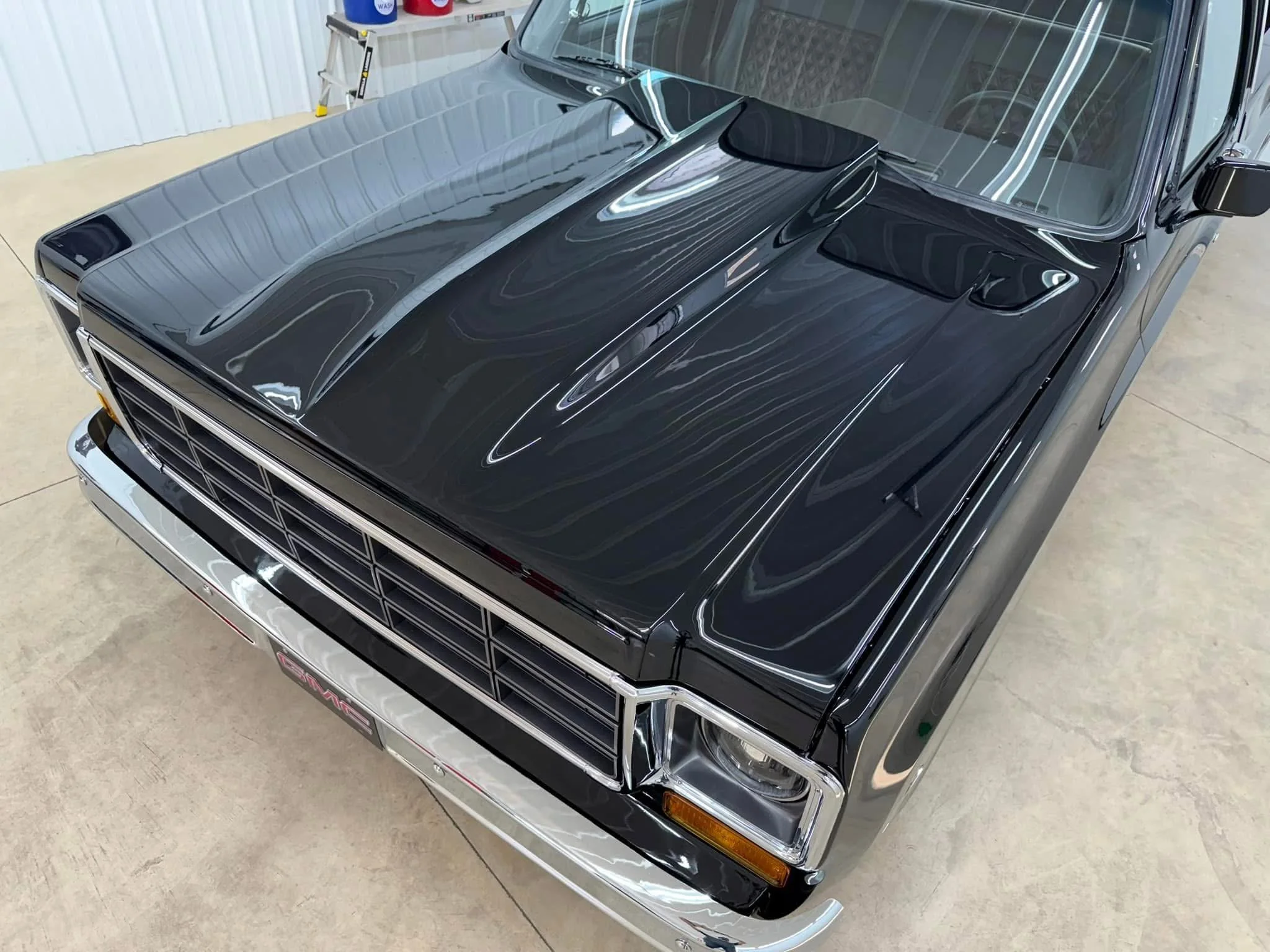 Black vintage car paint correction polished and ceramic coated.