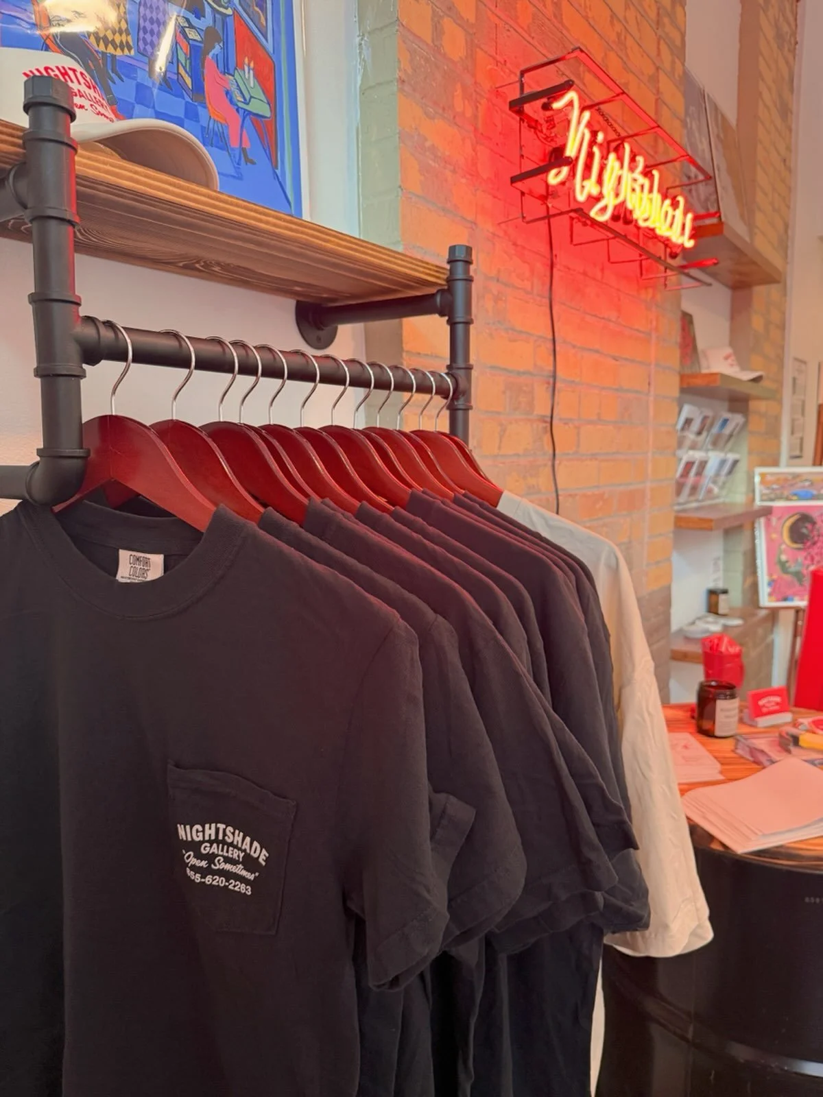 😮&zwj;💨 New merch drop and merch RACK ready for First Friday. 
Grab one from the gallery or on the website ❣️❣️❣️