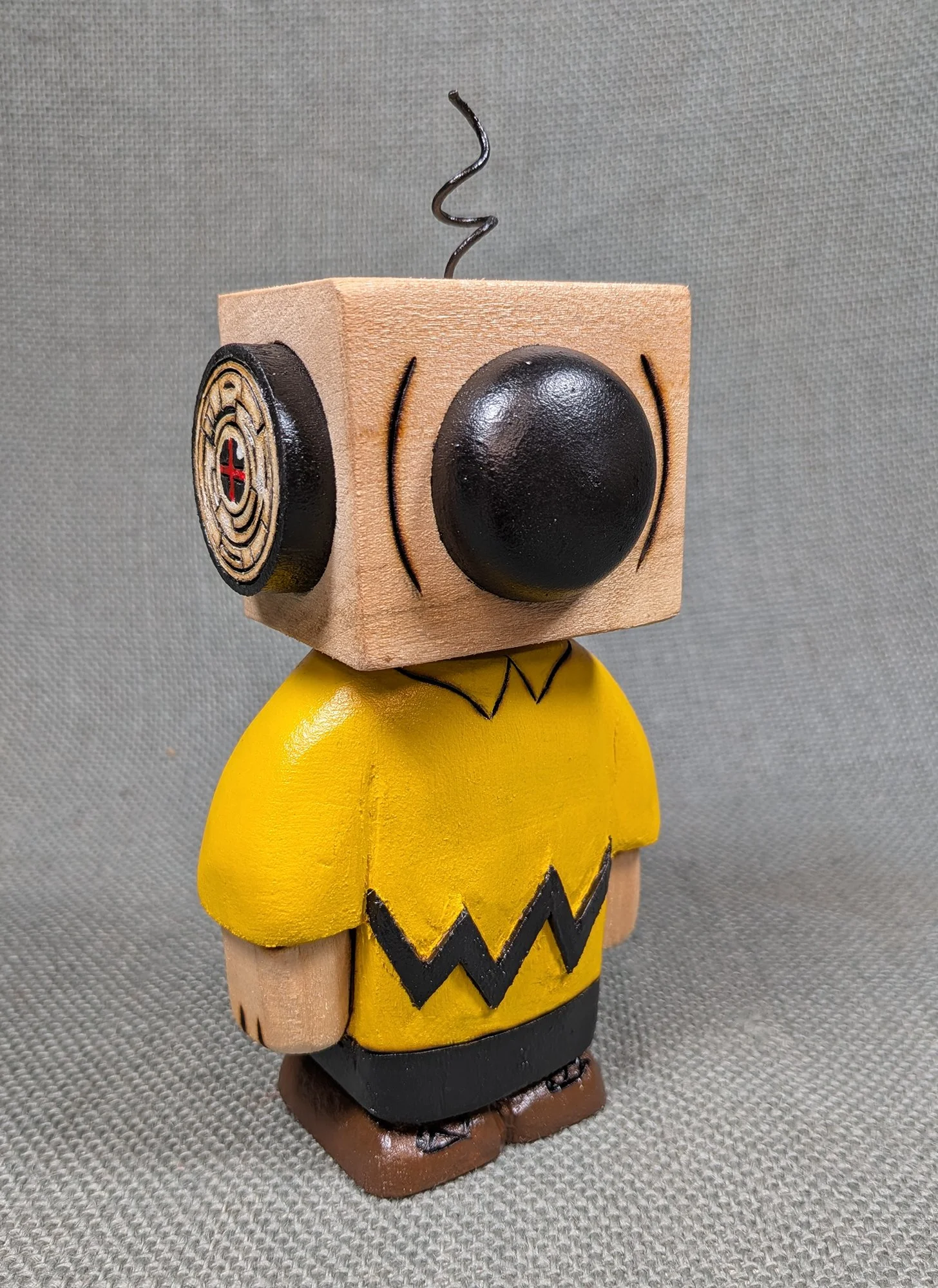 Chaos Woods, Blockhead Charlie, Wood, acrylic paint, metal	7" x 3.5" x 3"	 $ 500.00 
