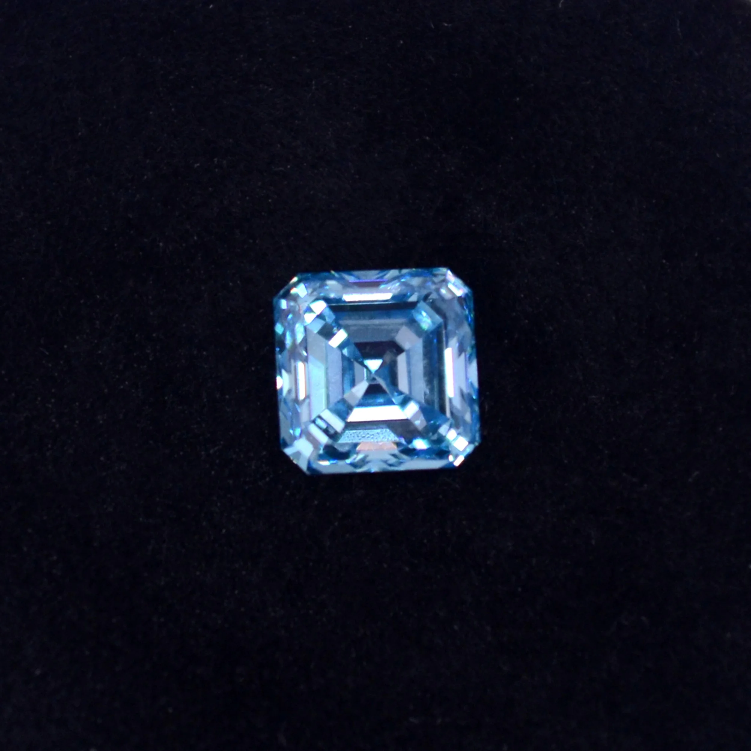 Asscher-cut blue cremation diamond crafted from pet ashes, showcasing EverDear™'s expertise in creating meaningful memorial keepsakes.