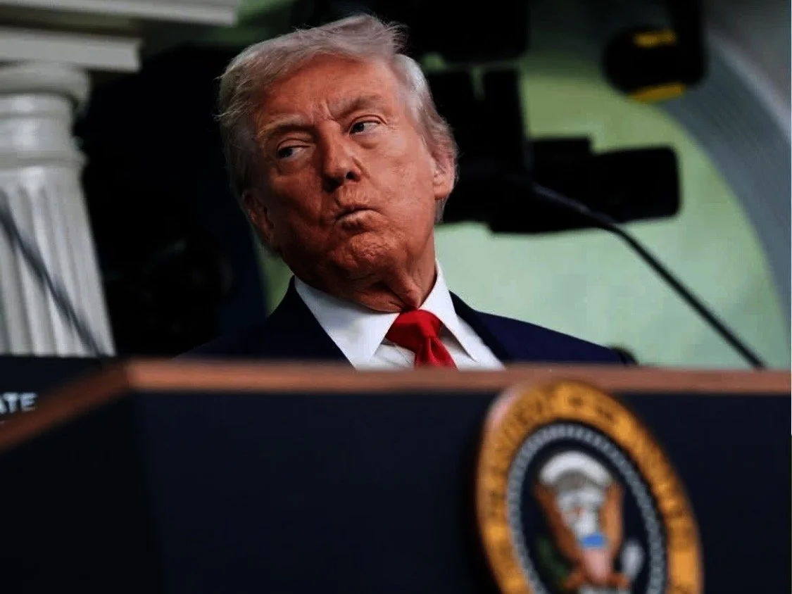 President Donald Trump pursed-tight lips