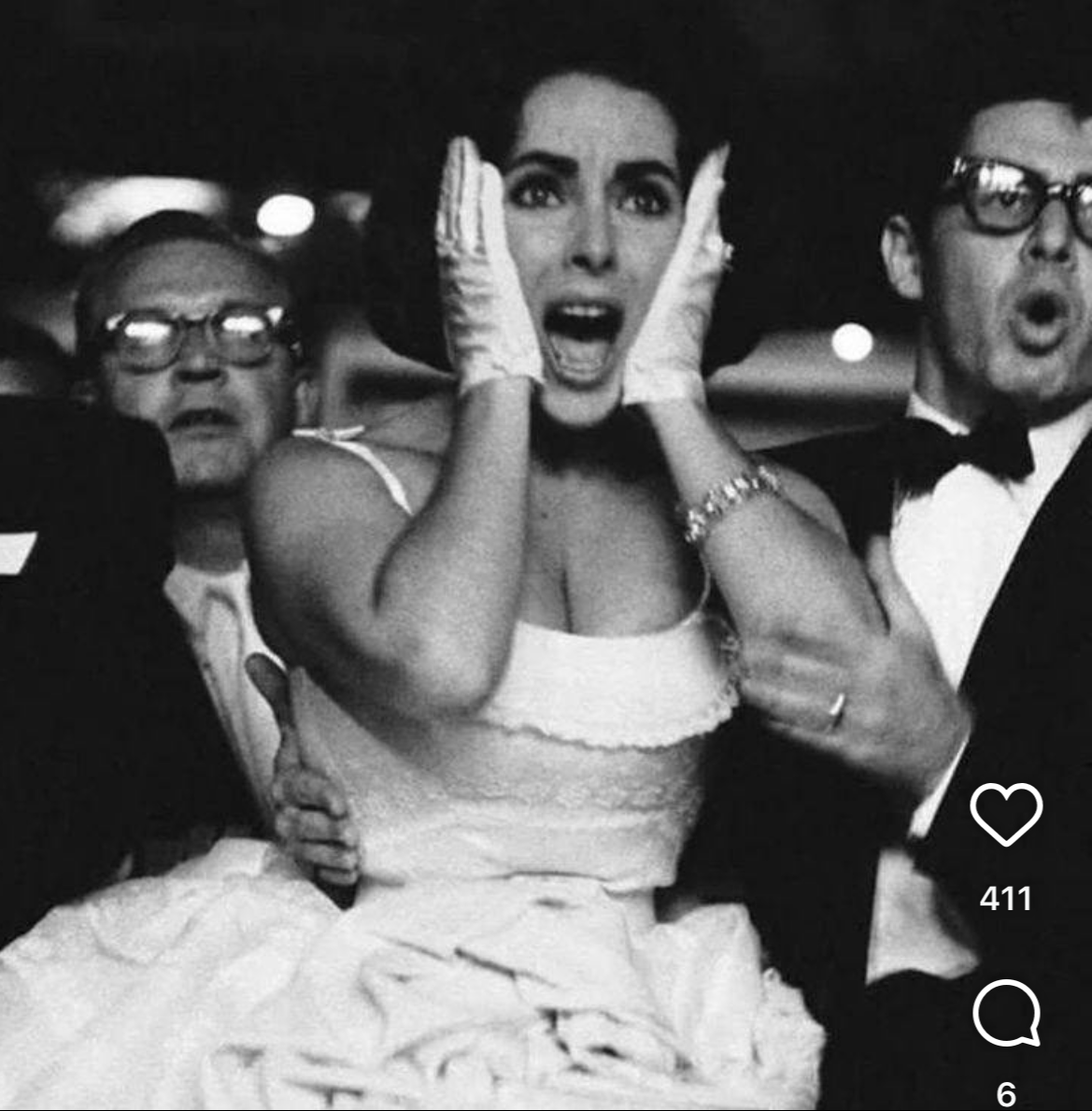 Elizabeth Taylor being dramatic at a boxing match in 1960