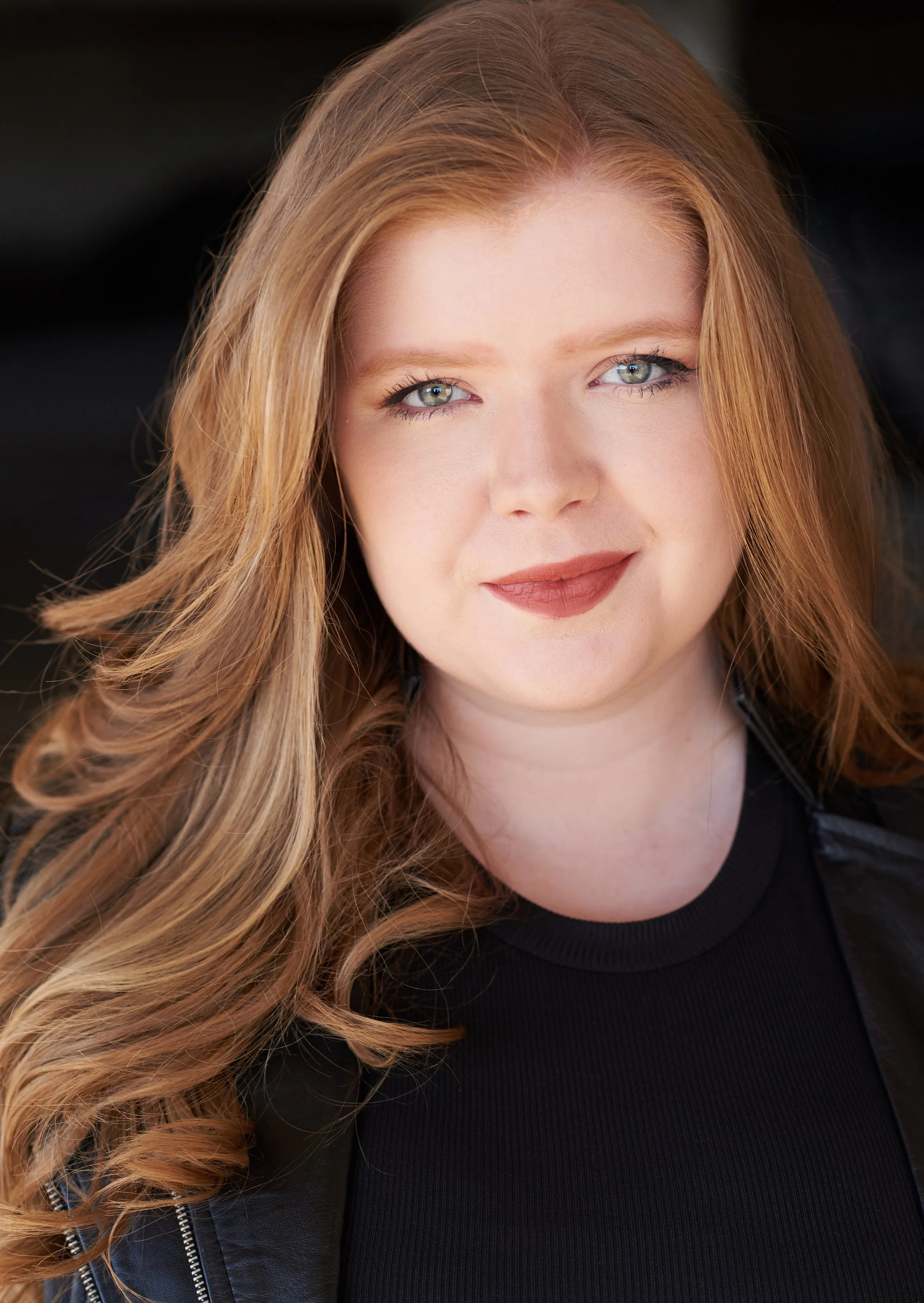 Erica Harkins Leather Headshot 2