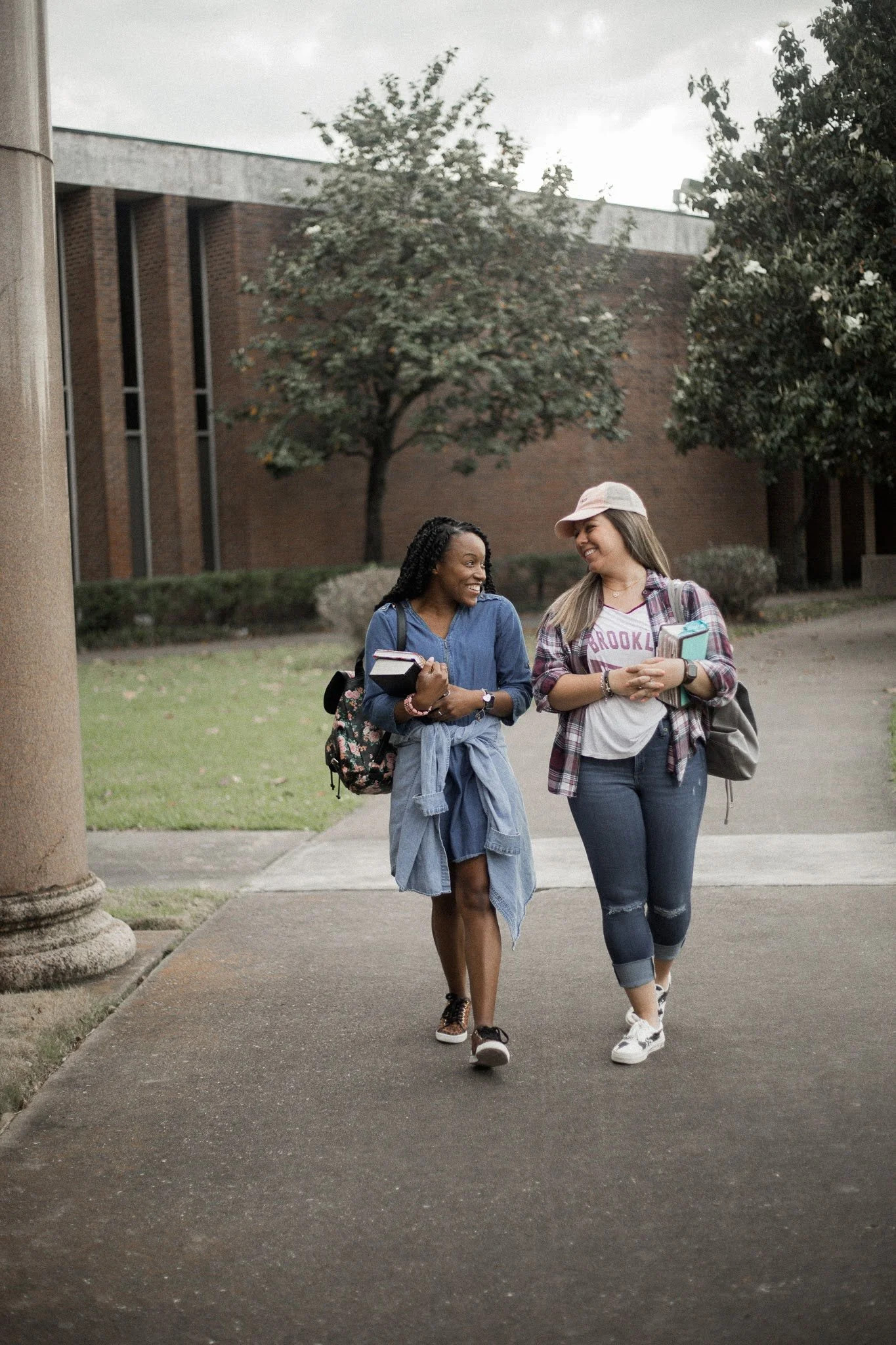 College girls walking to a Bible Study on their college campus that is student led