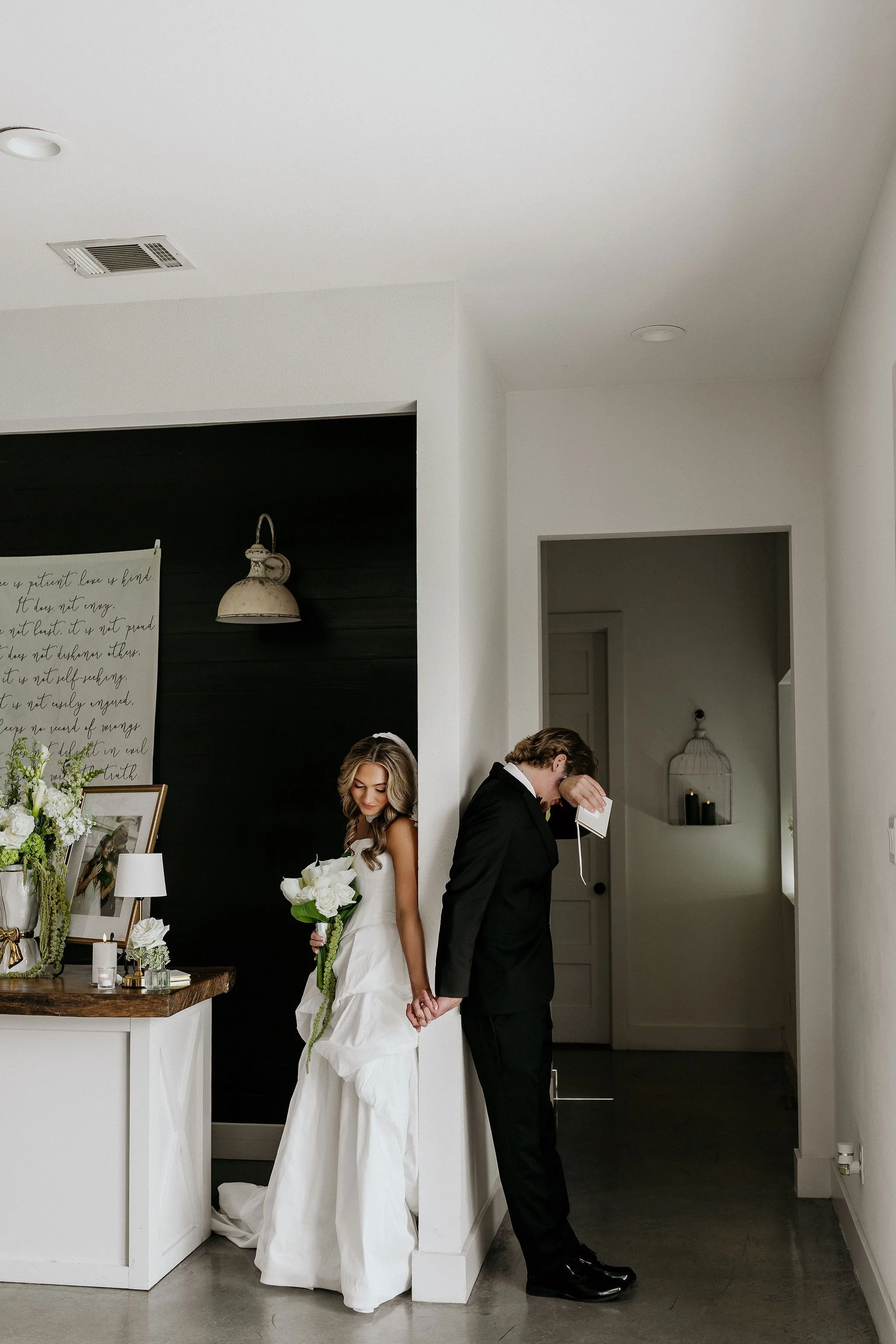 first look between bride and groom at modern barn venue