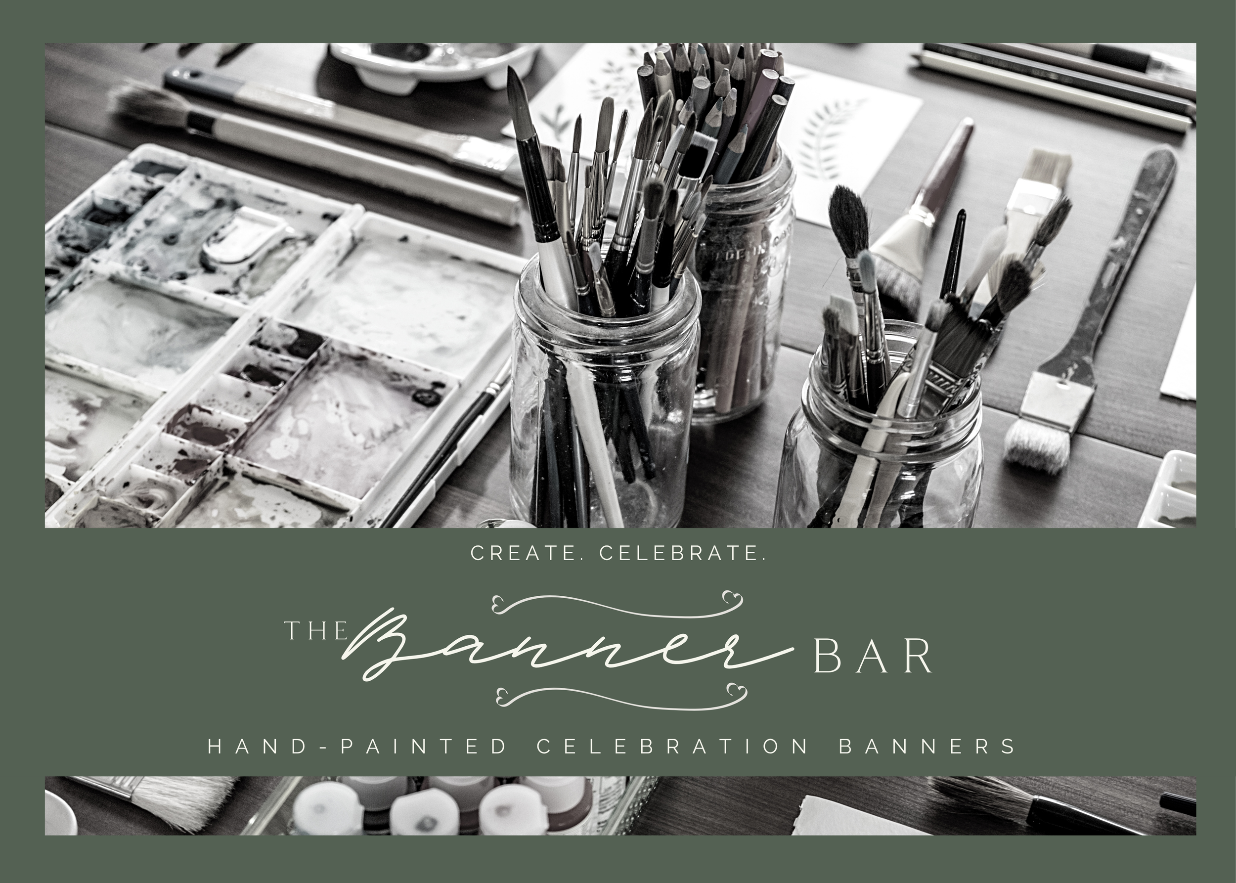 Black and white photo of art supplies including paintbrushes and markers in jars, with a watercolor palette, brushes, and paper on a wooden table.