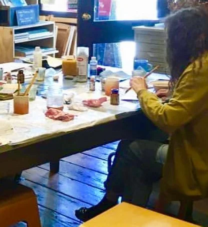 intently working at a gilding workshop, Point Reyes Station, CA, 2018.