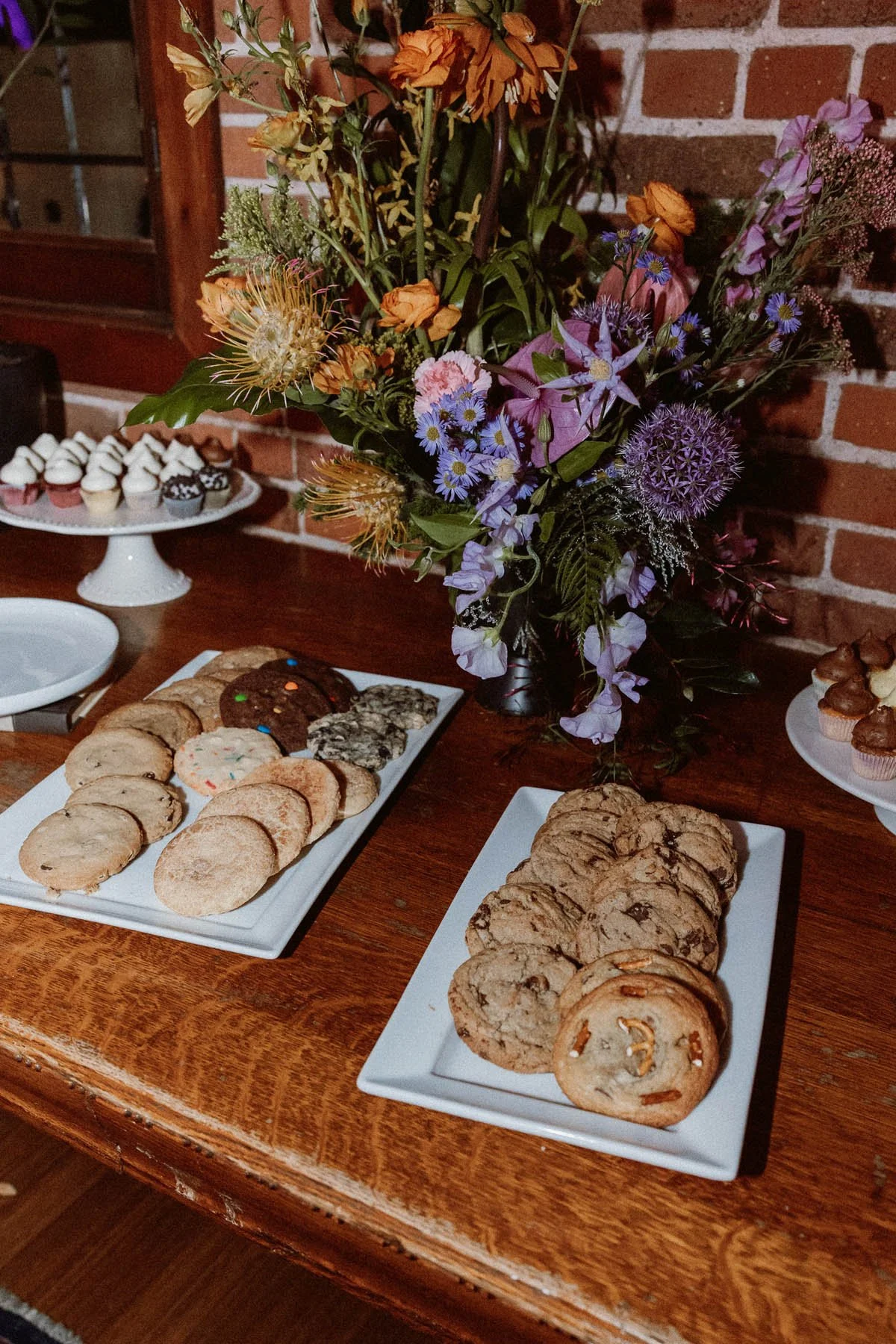 colorful-and-eclectic-florals-for-a-wedding-dessert-table.jpg