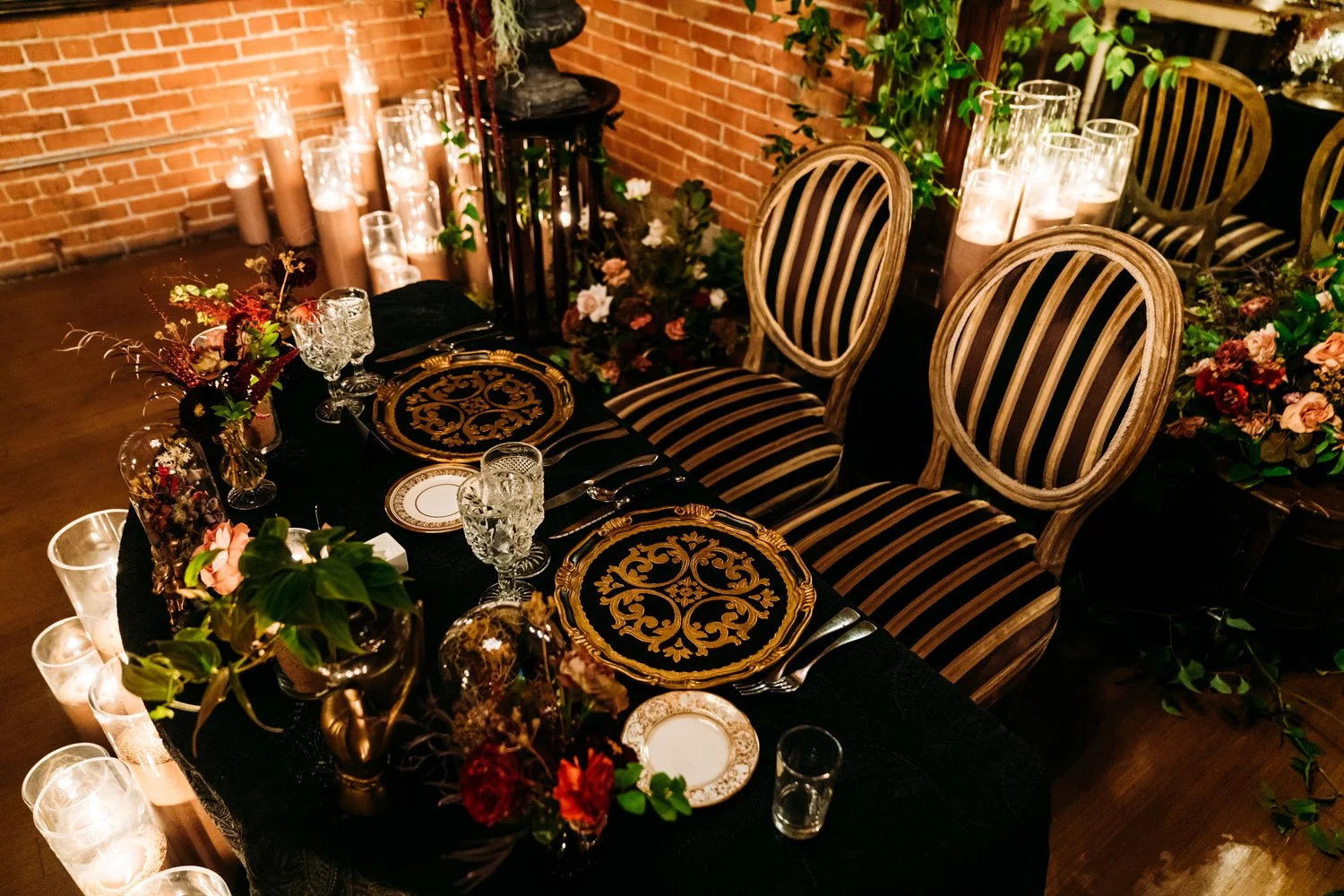 a-lush-and-dark-maximalist-sweetheart-table-for-a-halloween-wedding.jpg
