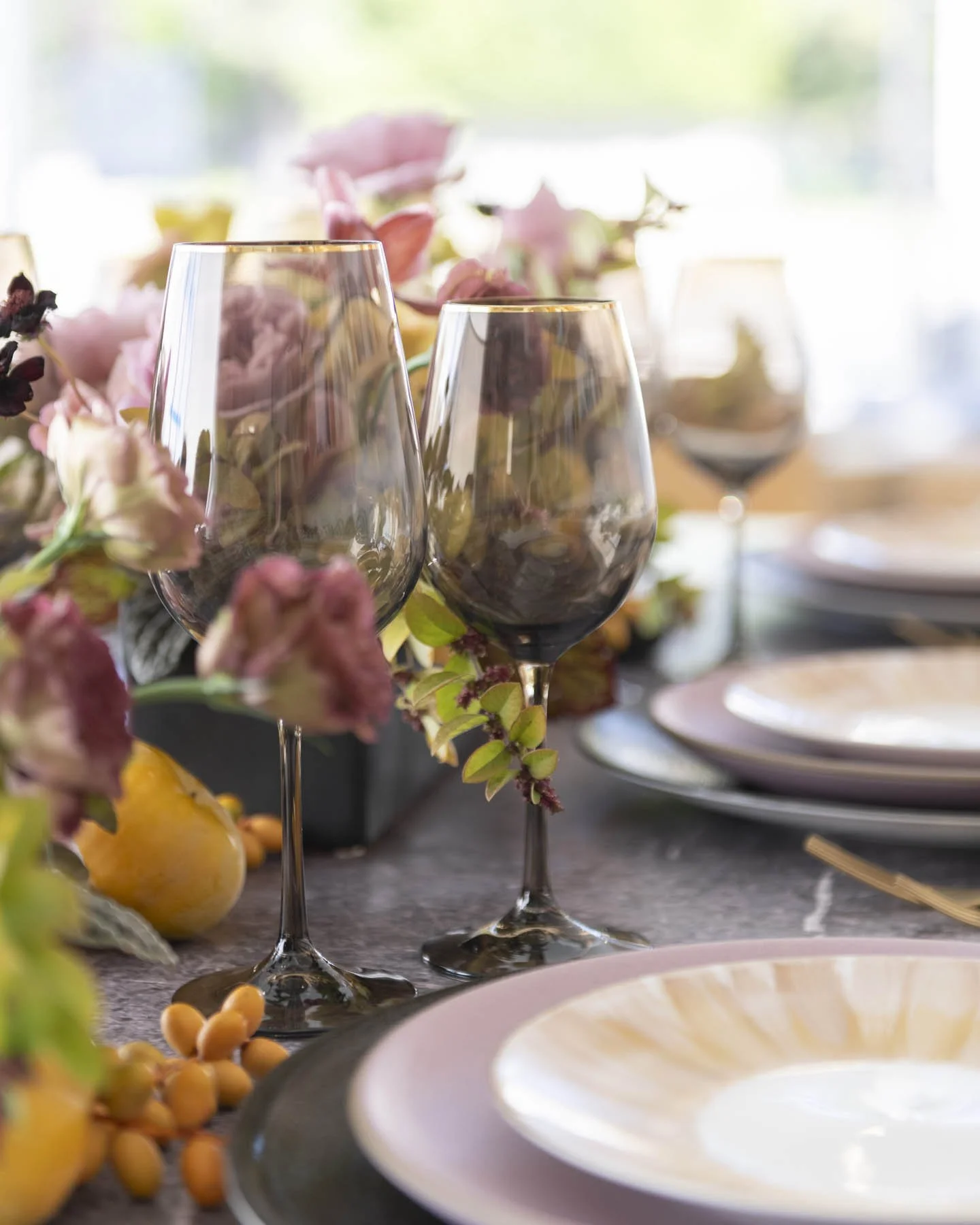 Smoky Glassware and Blush Table Settings for a Modern Floral Tablescape