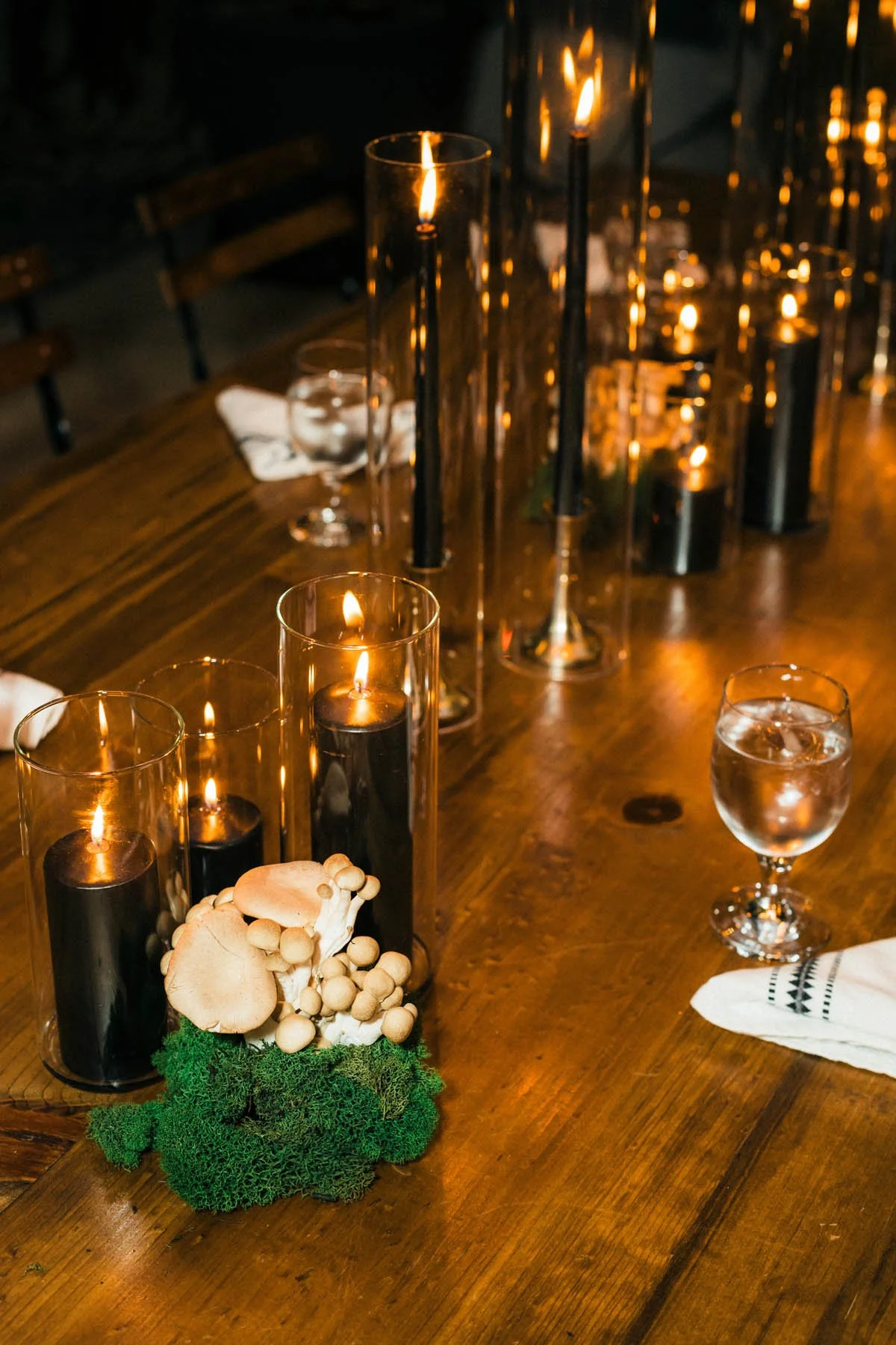 Mushroom and Candlelight Centerpiece on Wooden Table