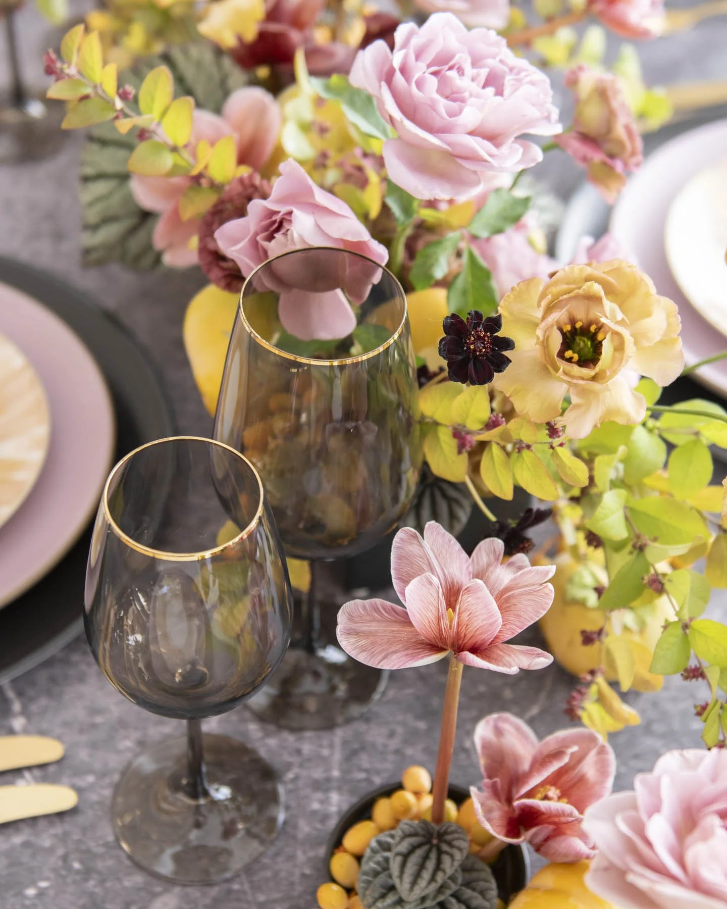Fine Art Wedding Centerpiece with Blush Roses, Burgundy Accents, and Gold-Rimmed Glassware