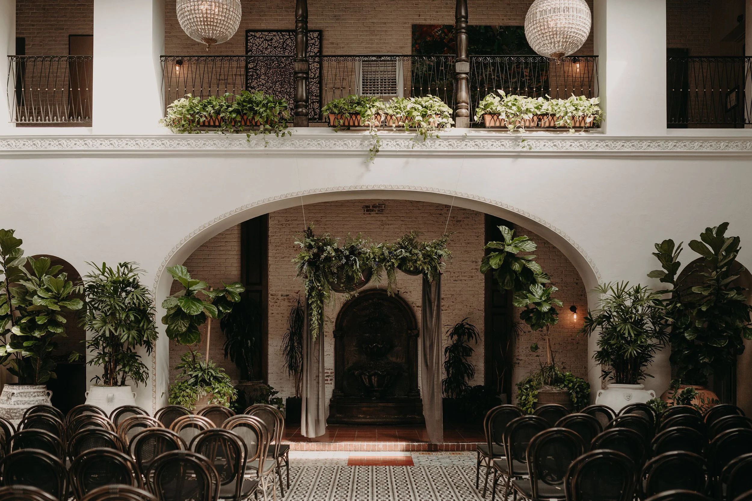A plant adorned wedding arch at the Ebell Long Beach.jpg