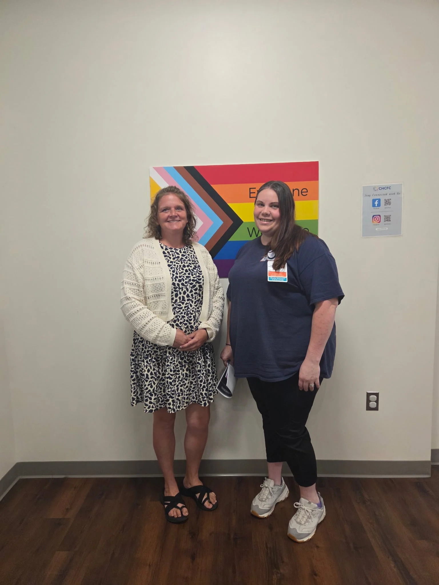 A photo of two people representing our Orange Community Health Worker Team