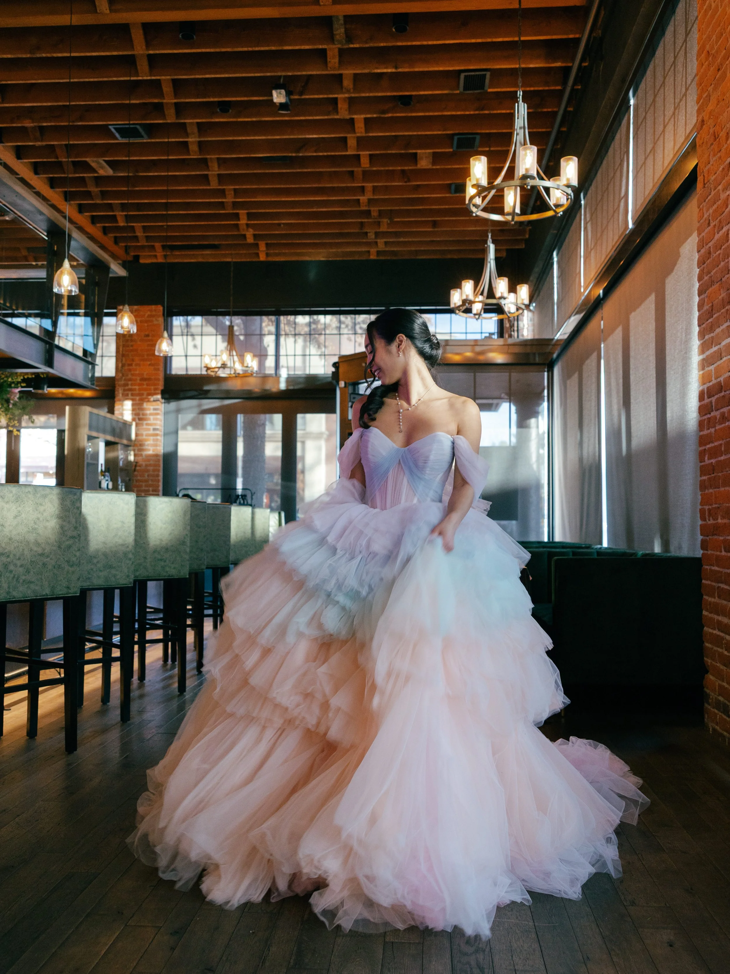 bride-wearing-layerest-rainbow-tulle-ballgown.jpg